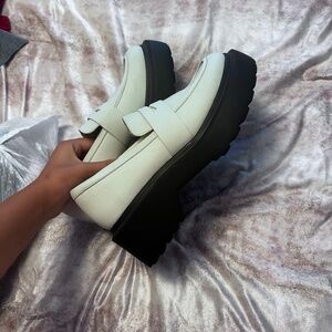 White platform loafers